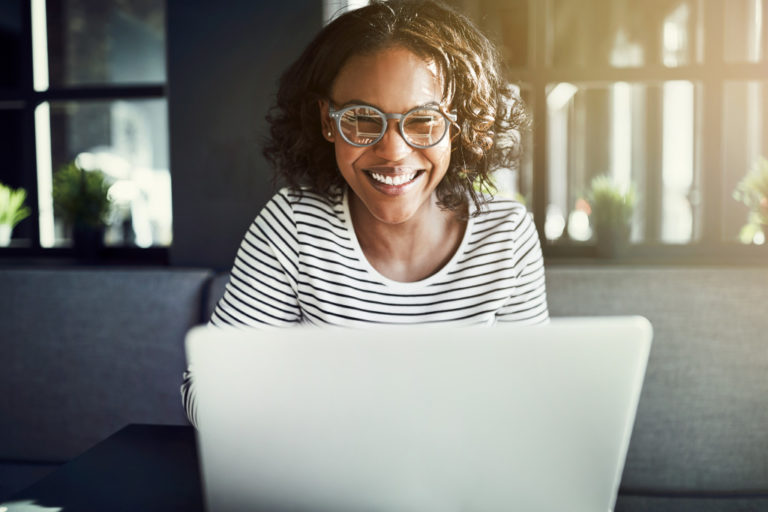a woman working on their computer